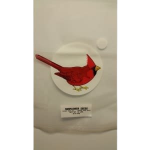 Round white ceramic plate featuring a vibrant red cardinal illustration, displayed on white fabric background