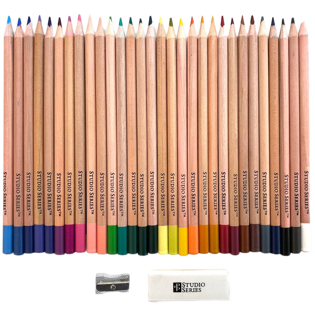 Studio Series colored pencils set arranged in a row with sharpener and eraser for arts and crafts collections