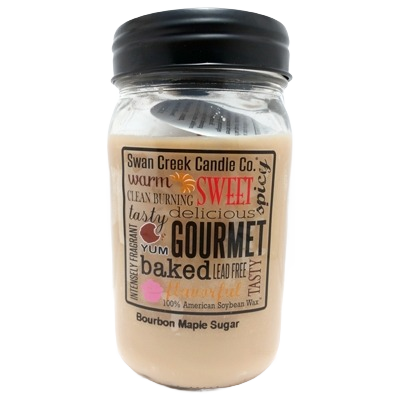 Clear glass jar candle with black lid featuring warm bourbon maple sugar scent label and soy wax fill