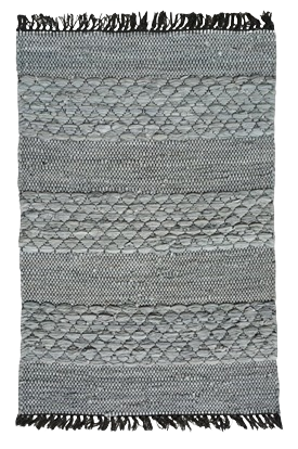 Grey woven rag rug with textured stripes and fringe edges, suited for home decor and floor covering use