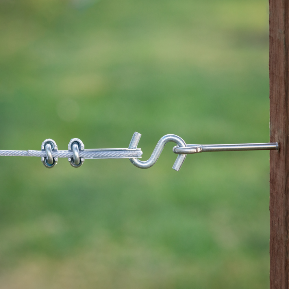 Stainless steel heavy open S hook securing cable wire with clamps to wooden post in hardware and fasteners collections