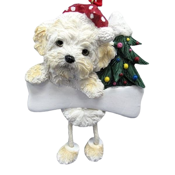 White Shihpoo dog ornament with dangling legs holding a bone and decorated Christmas tree in holiday collection under $50