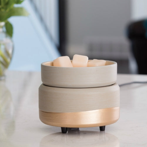 Compact 2-in-1 warmer with gray finish and gold accents melting wax melts for home accents and decor collections