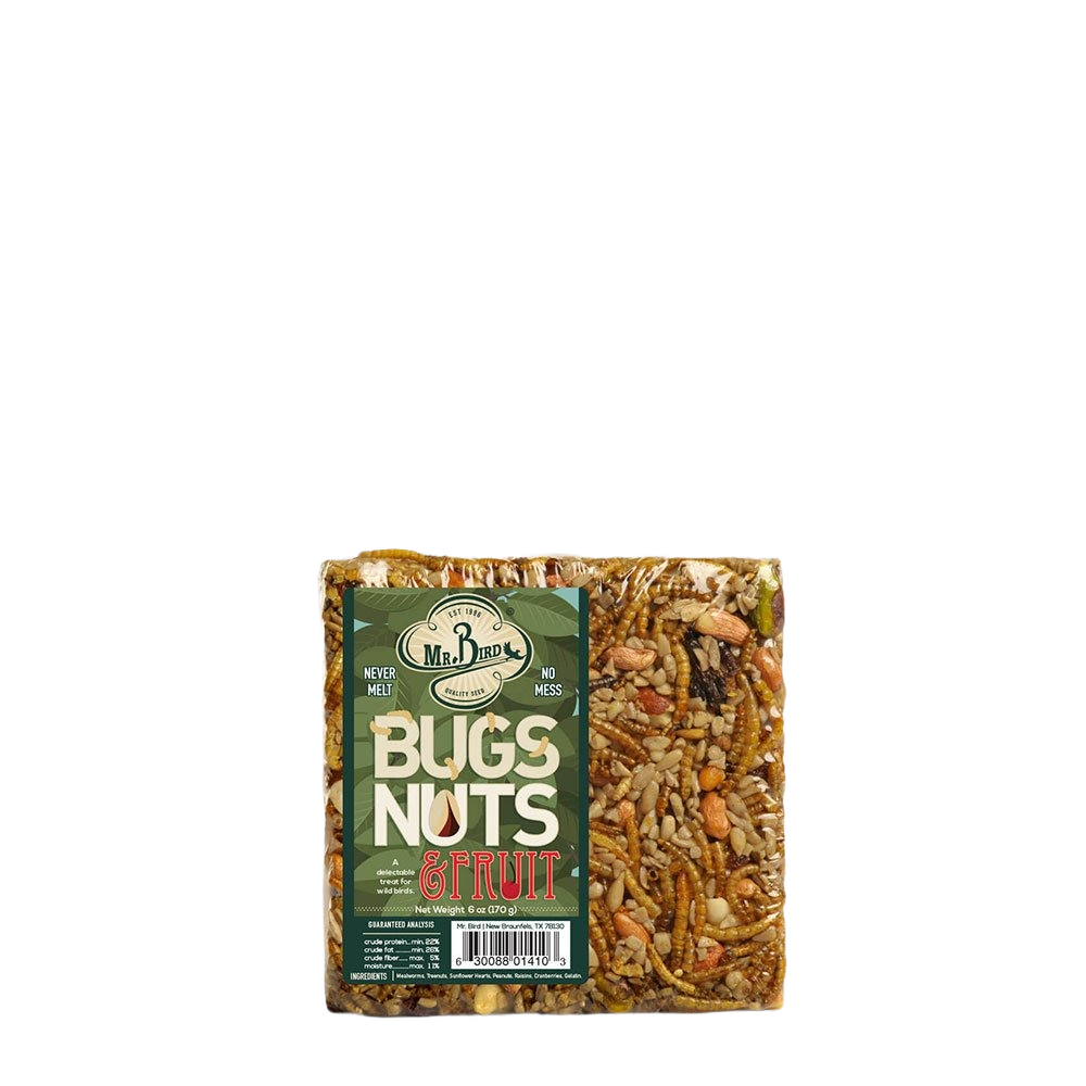 Compact seed cake with nuts, dried fruit, and insects, designed for feeding small wild birds outdoors