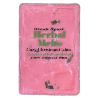 Pink herbal wax melts with cozy Christmas cabin scent made from natural ingredients for home fragrance use
