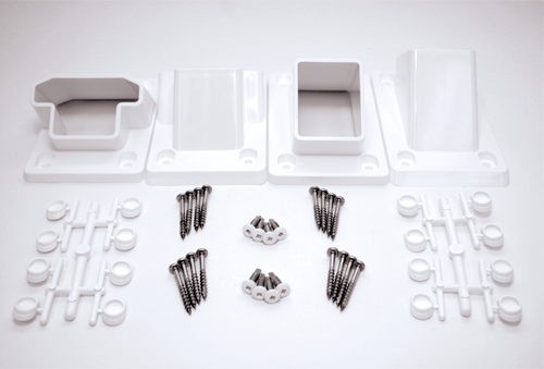 Set of white vinyl stair railing brackets and mounting hardware with screws for home improvement projects