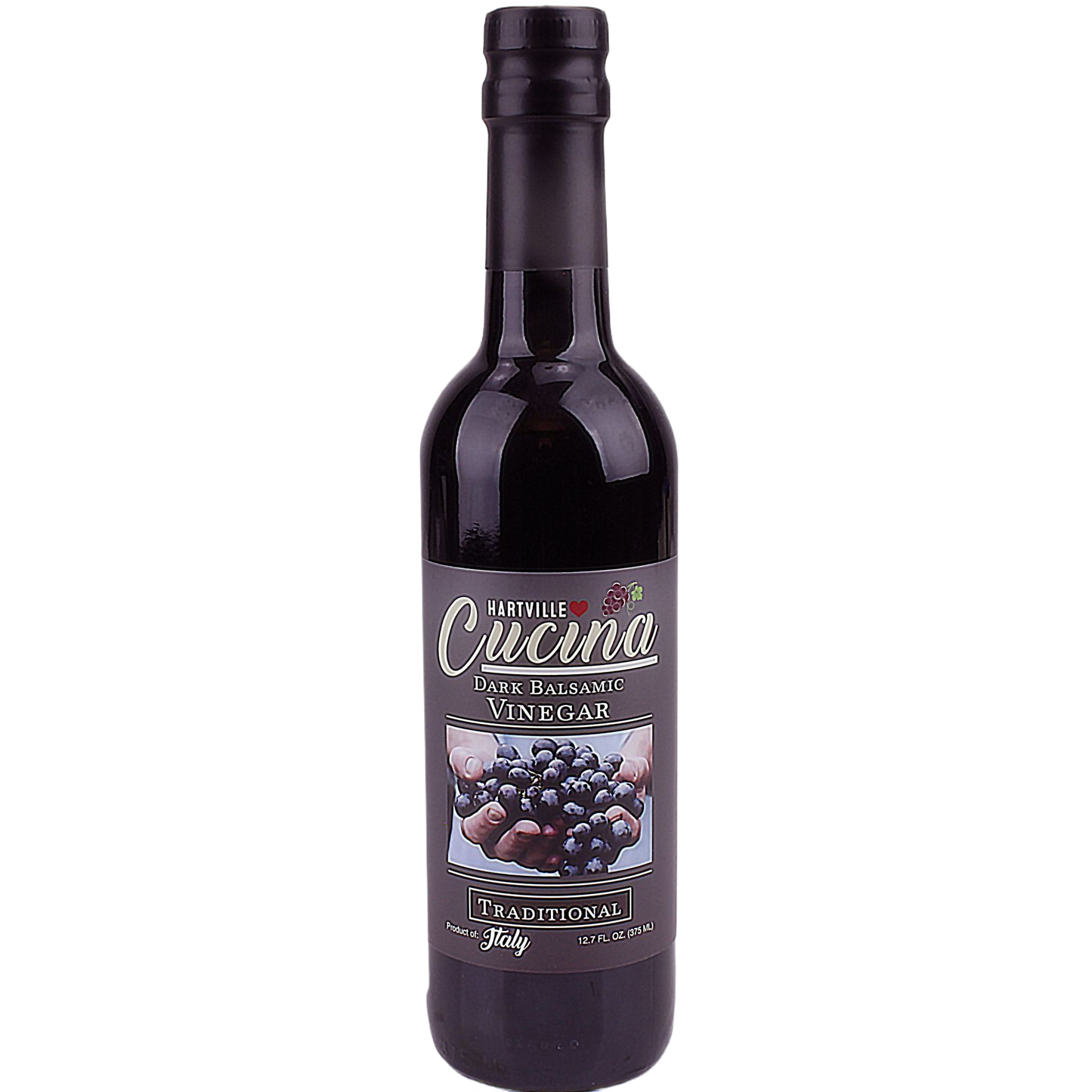 Bottle of traditional dark balsamic vinegar with Italian label for salad dressings and food collections