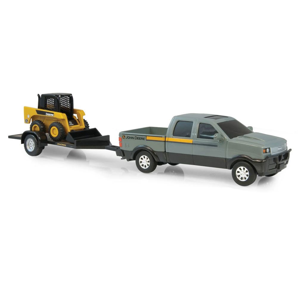 Gray toy pickup truck towing a trailer with a yellow toy construction loader from Vehicles & Remote Controlled Toys collection
