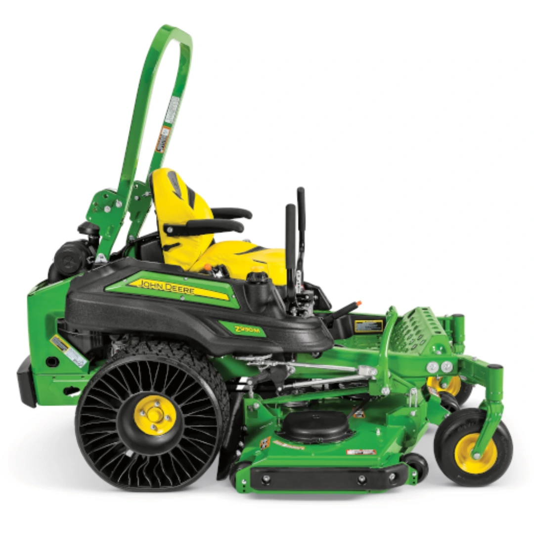 Green and yellow zero-turn mower with 60-inch Mulch On Demand deck and airless Tweel tires for home improvement tasks