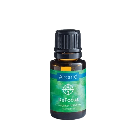 Amber glass bottle of ReFocus essential oil concentrate with green and blue label and black screw cap