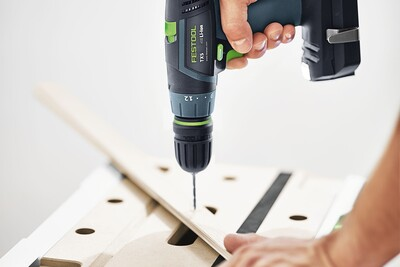 Festool keyless drill chuck on cordless drill used on wood piece in power tool accessories and home improvement