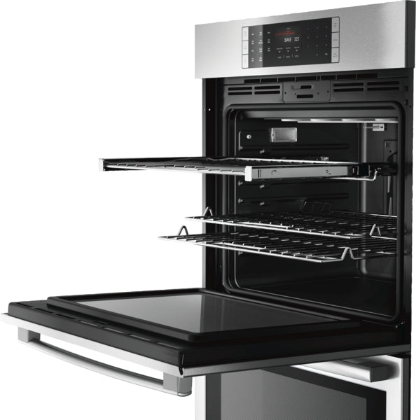 Modern stainless steel double wall oven with open door, digital touch control panel, and adjustable racks in kitchen setting