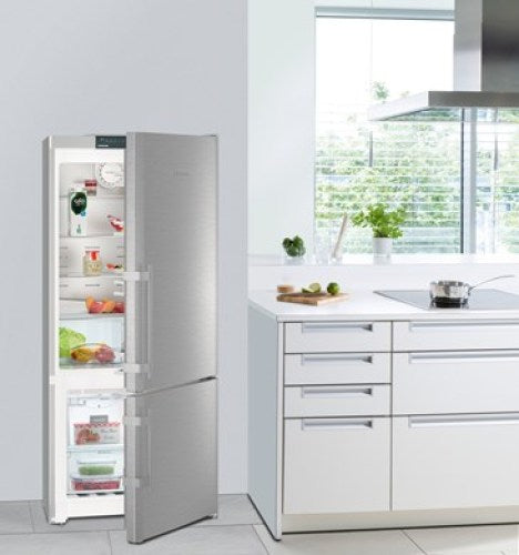 30" stainless steel fridge-freezer with no frost, open door showing organized interior in modern kitchen setting