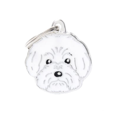 White dog-shaped pet ID tag with black details and attached metal keyring for pet identification and safety