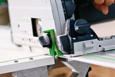 Close-up of a plunge cut saw with splinter guard accessory for smooth, splinter-free cuts in Power Tool Accessories.
