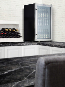 19-inch wide beverage center with black cabinet and stainless steel trimmed glass door for kitchen appliances