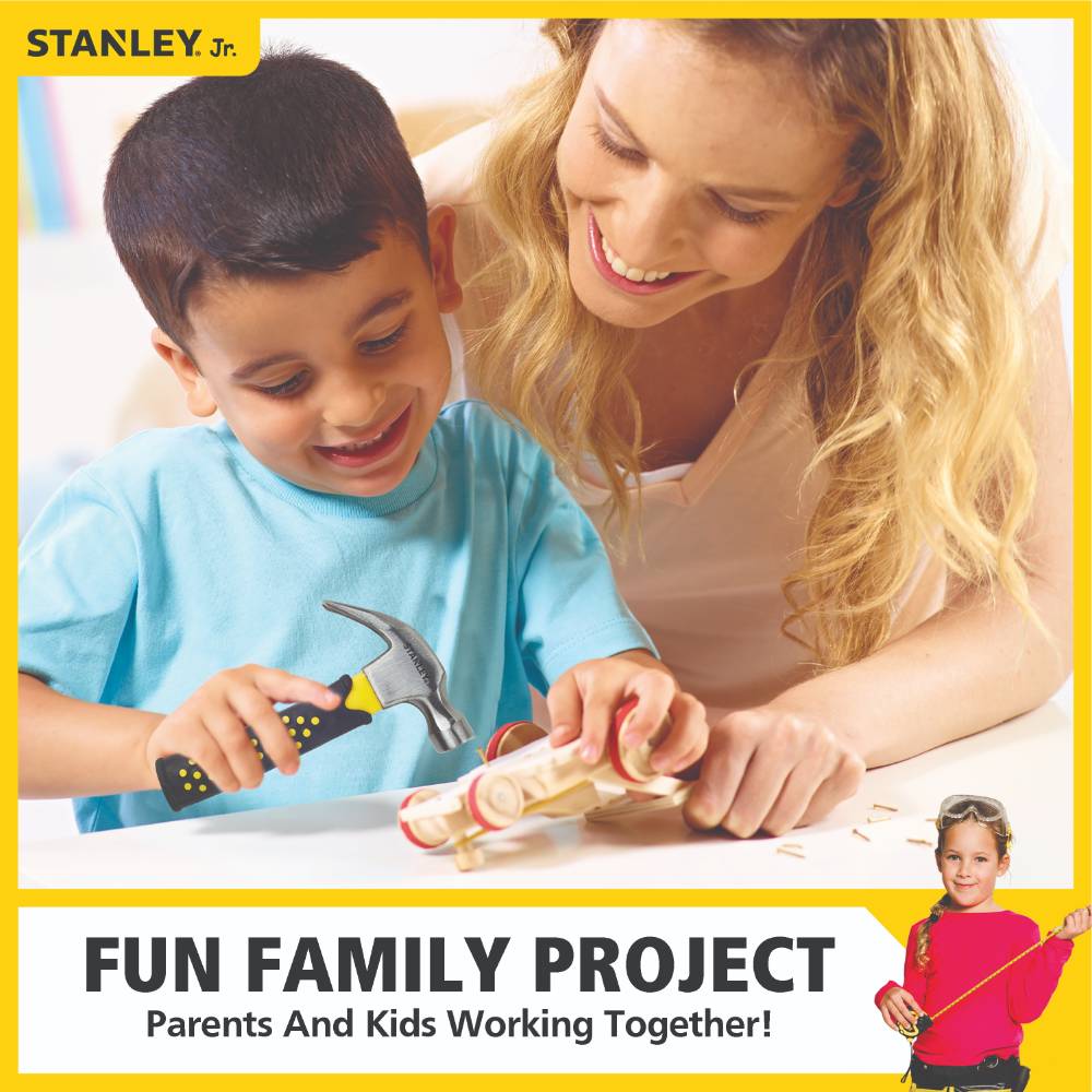 Mother and young boy using a child-sized hammer on a wooden toy in Toys & Games under $50 collection