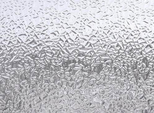 Textured privacy window film with a glacier pattern for light diffusion in home improvement projects