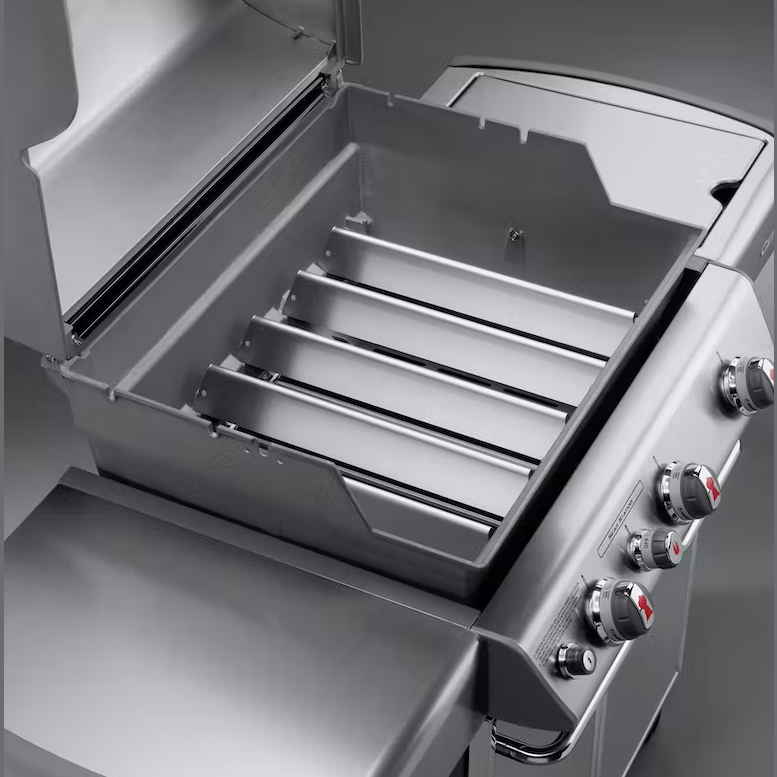 Inside view of stainless steel grill with four front mount flavorizer bars for burner protection in grill accessories collection