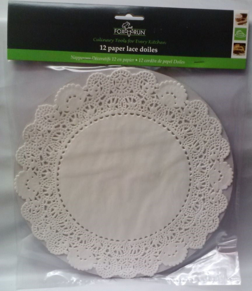 Set of 12 white paper lace doilies with intricate patterns, ideal for elegant table settings in kitchenware collection