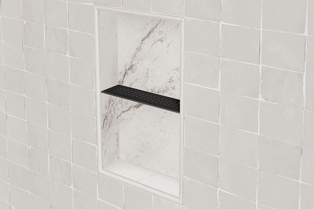 Matte black floral rectangular niche shelf installed in tiled shower wall for home improvement and tile flooring collections
