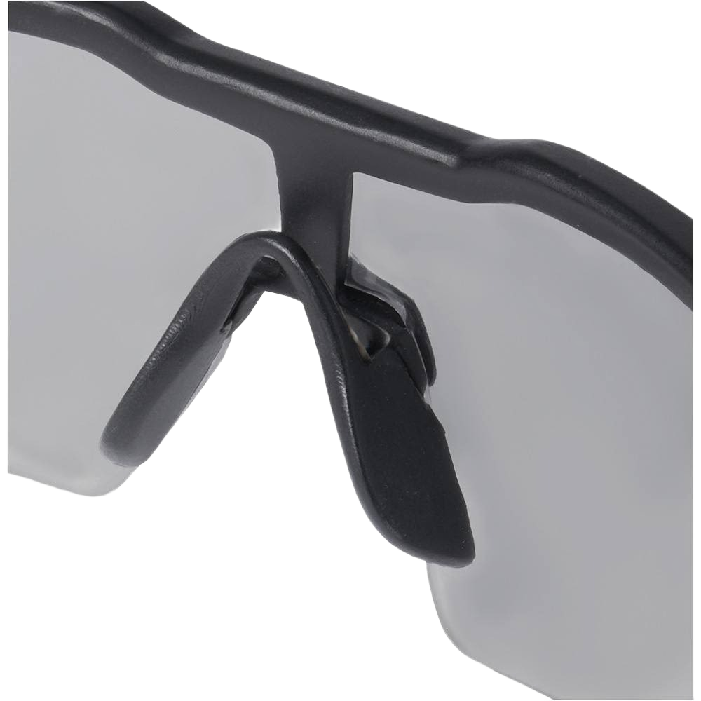 Close-up of gray-tinted safety glasses featuring flexible nose pads for comfortable wear during home improvement tasks