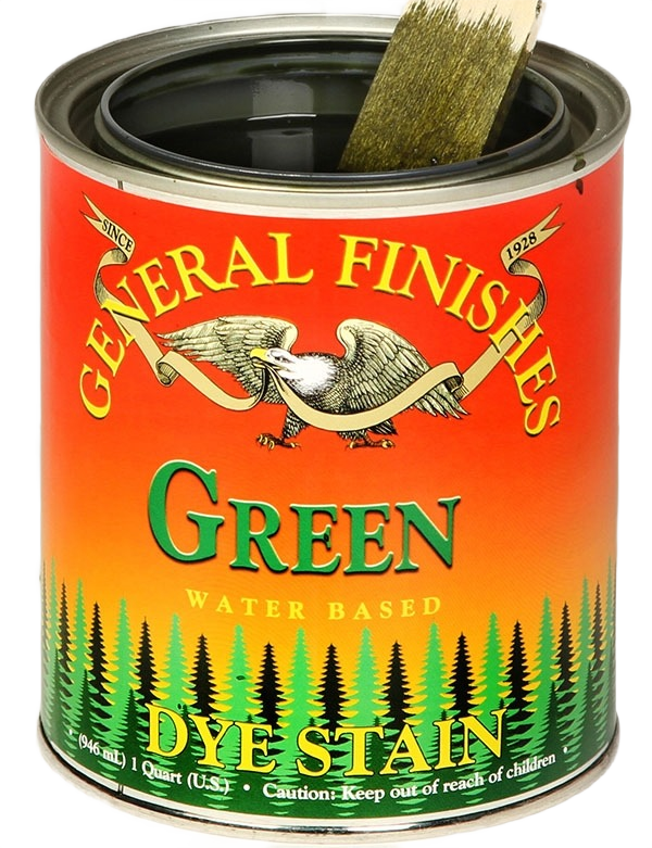Open can of green water-based dye stain with brush dipped inside for wood staining in home improvement projects