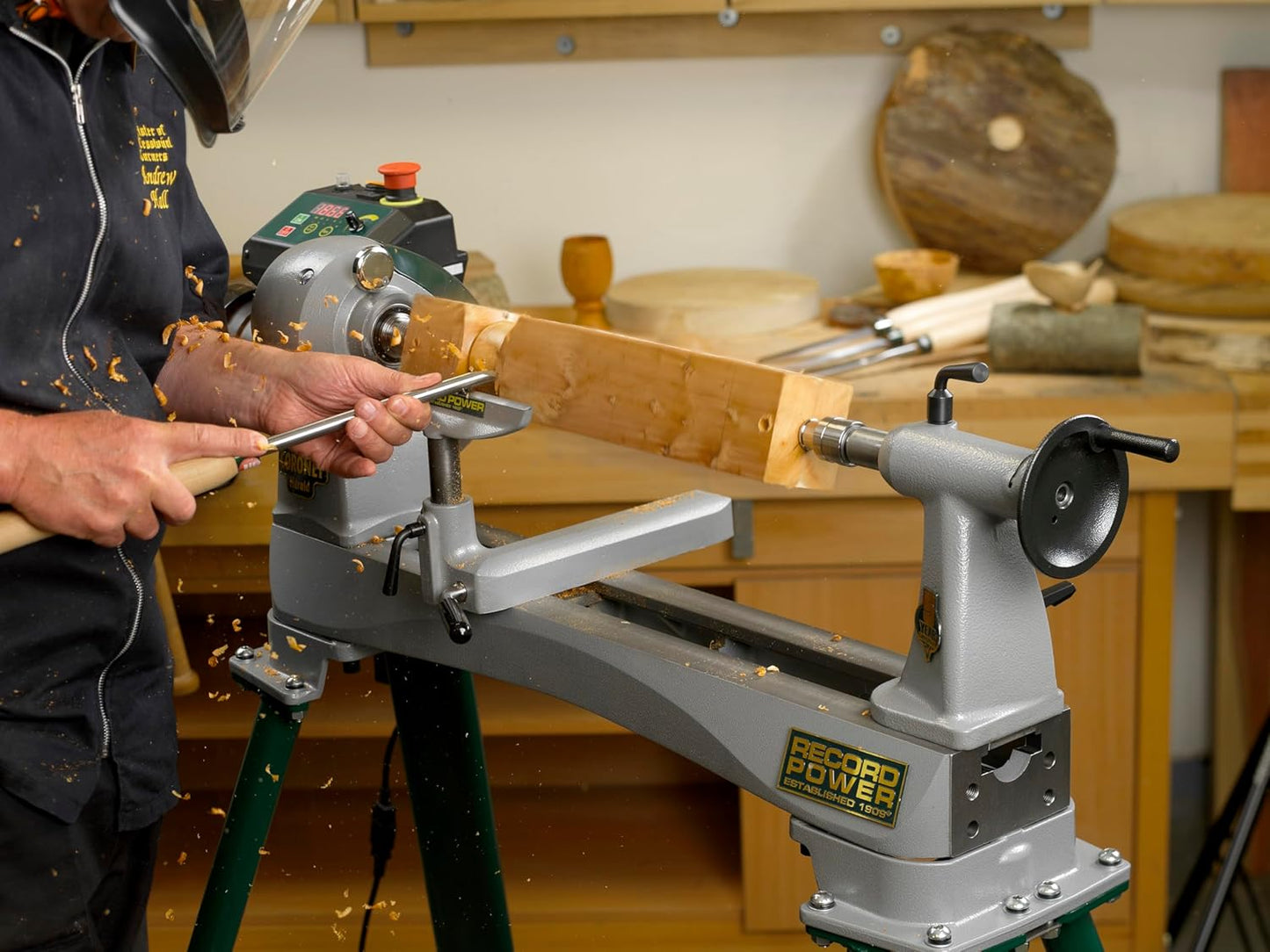 Metal ring center with tapered shaft mounted on woodworking lathe for precision wood turning tasks and home improvement projects