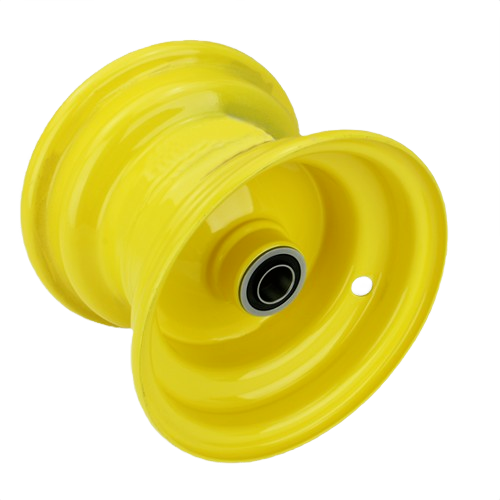 Bright yellow metal rim with central bearing and single valve hole for machinery or tractor equipment maintenance tasks