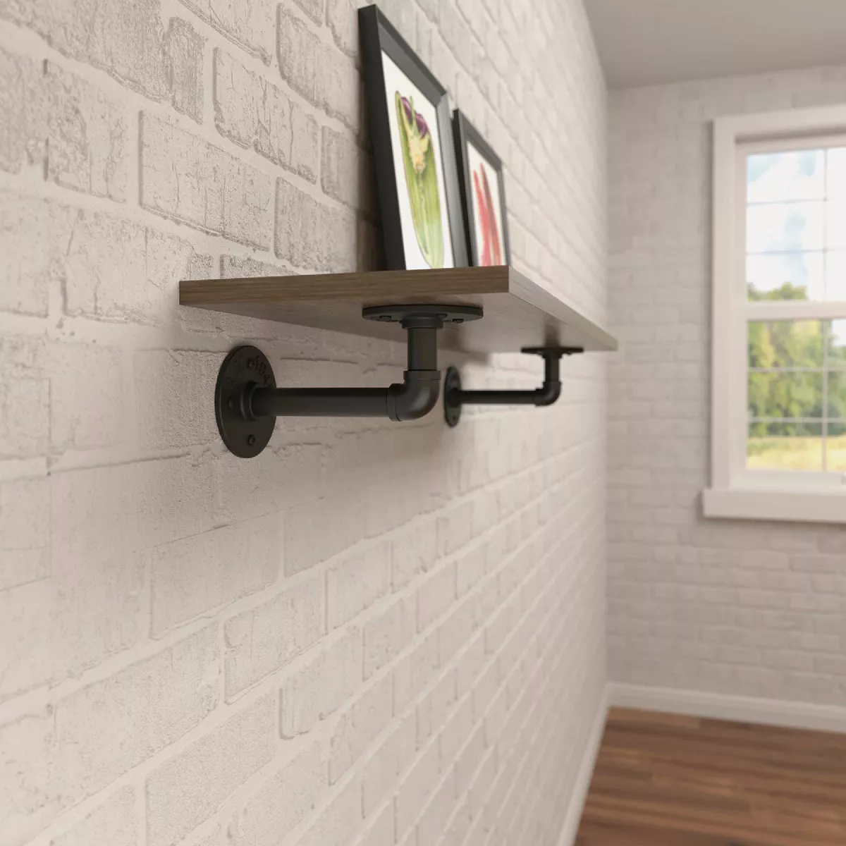 Black elbow pipe shelf brackets mounting a wooden shelf on a white brick wall for home improvement use