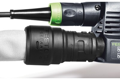 Close-up of Festool power tool connected to a dust extractor hose with anti-static sleeve for woodworking tools use