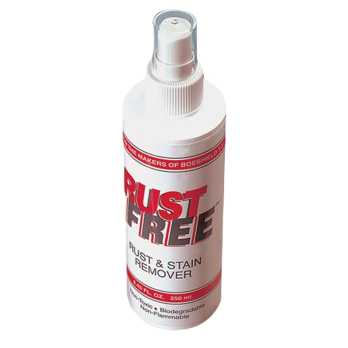 White spray bottle of rust and stain remover with red and black label for tools and home improvement tasks
