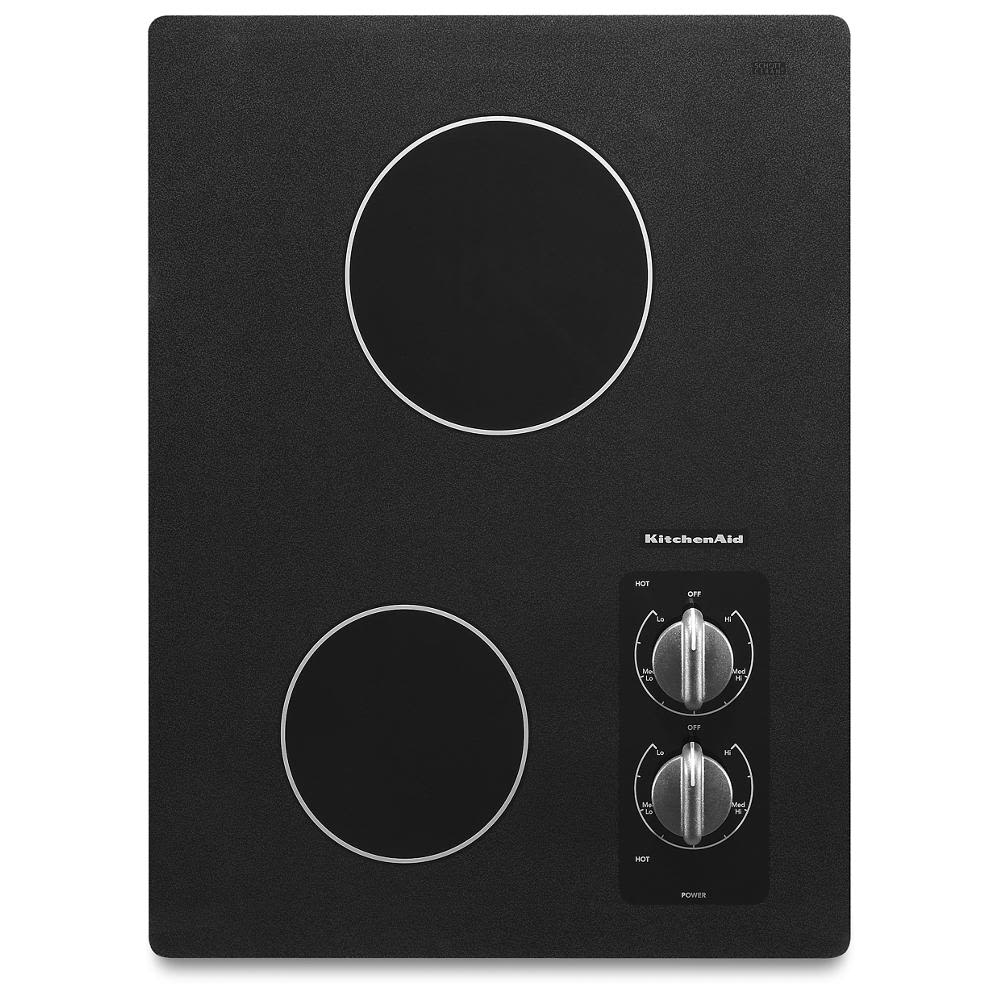 Black ceramic-glass electric cooktop with two radiant heating elements and manual control knobs in KitchenAid appliances collection