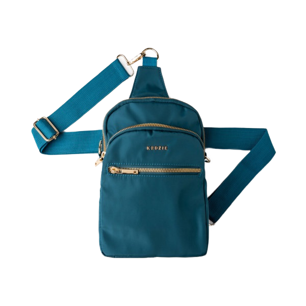 Teal fabric convertible sling bag with gold-tone zippers and branding, featuring two front zippered pockets and adjustable straps, part of Clothing & Shoes, Accessories, Bags & Wallets collections at Hartville Hardware.