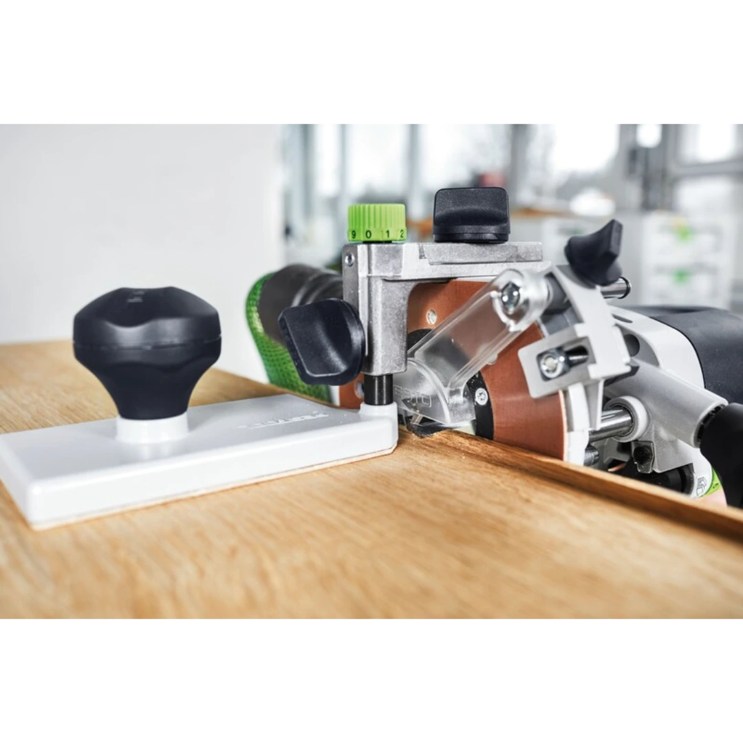 Silver and green router edging plate with black knobs securing wood for flush trimming in woodworking tool accessories collection