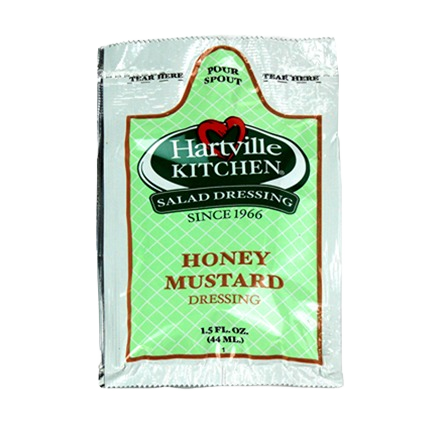Single 1.5 oz packet of Hartville Kitchen honey mustard salad dressing with green and white packaging design