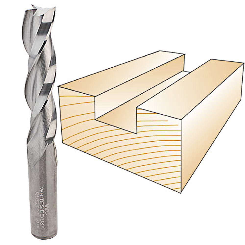 Three flute spiral upcut drill bit next to a wood piece with a clean groove in tool accessories for home improvement