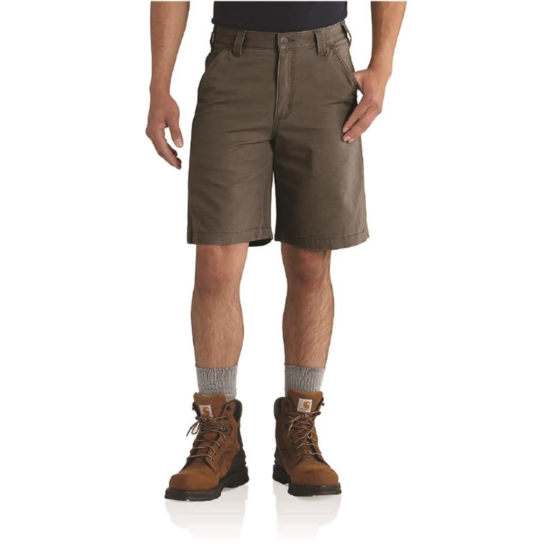 Brown durable work shorts with relaxed fit worn with gray socks and brown leather work boots for home improvement tasks