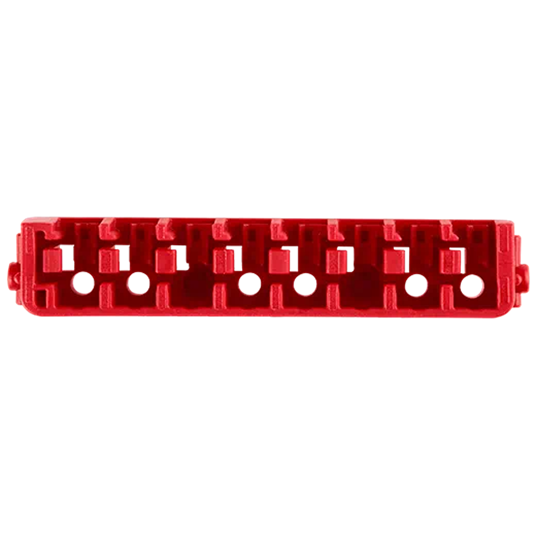 Red plastic insert bit accessory row with slots and holes for tool storage and workshop organization under $50