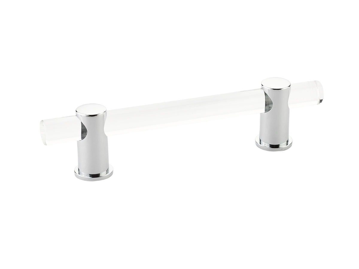 Polished chrome and acrylic cabinet handle with sleek cylindrical supports for modern home improvement projects