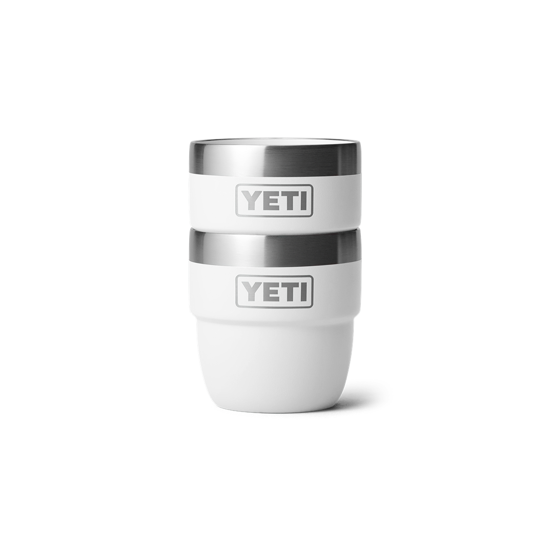 Two white stackable insulated cups with stainless steel rims for durable use in kitchen and drinkware collections