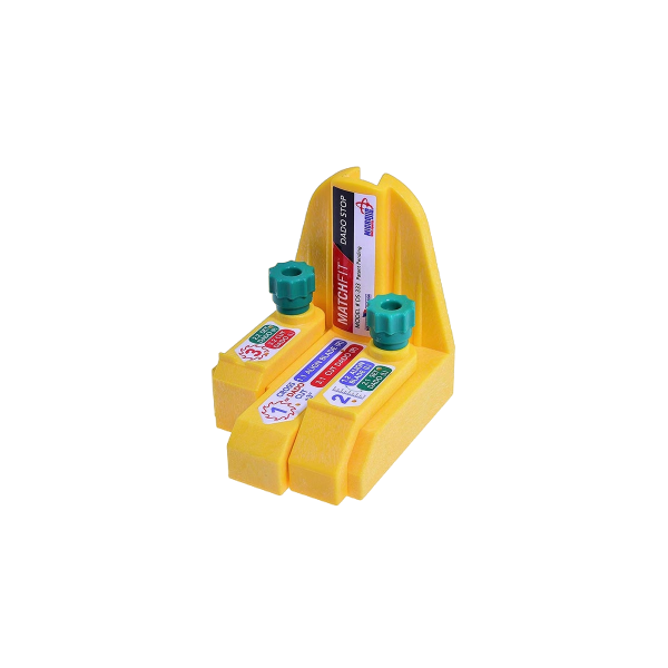 Yellow plastic dado stop accessory with green adjustment knobs for precise saw blade setup in woodworking tools.