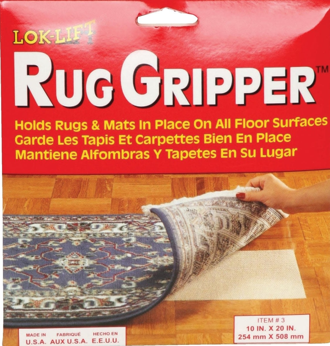 Packaging for Lok-Lift nonslip rug gripper showing placement under rug corner on hardwood flooring surface
