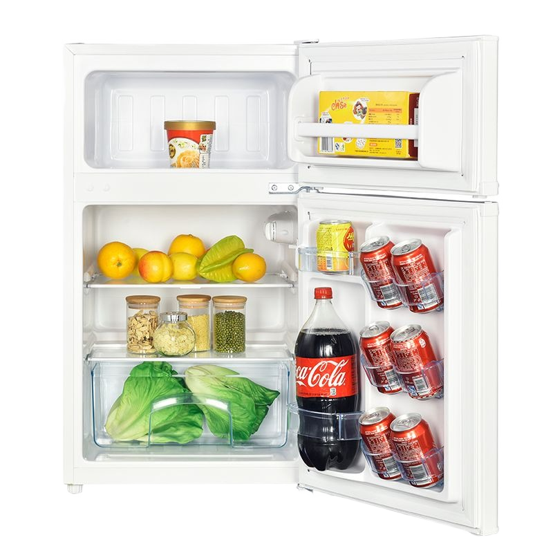 White two-door counter refrigerator stocked with beverages, fresh produce, and pantry items for kitchen and appliance collections