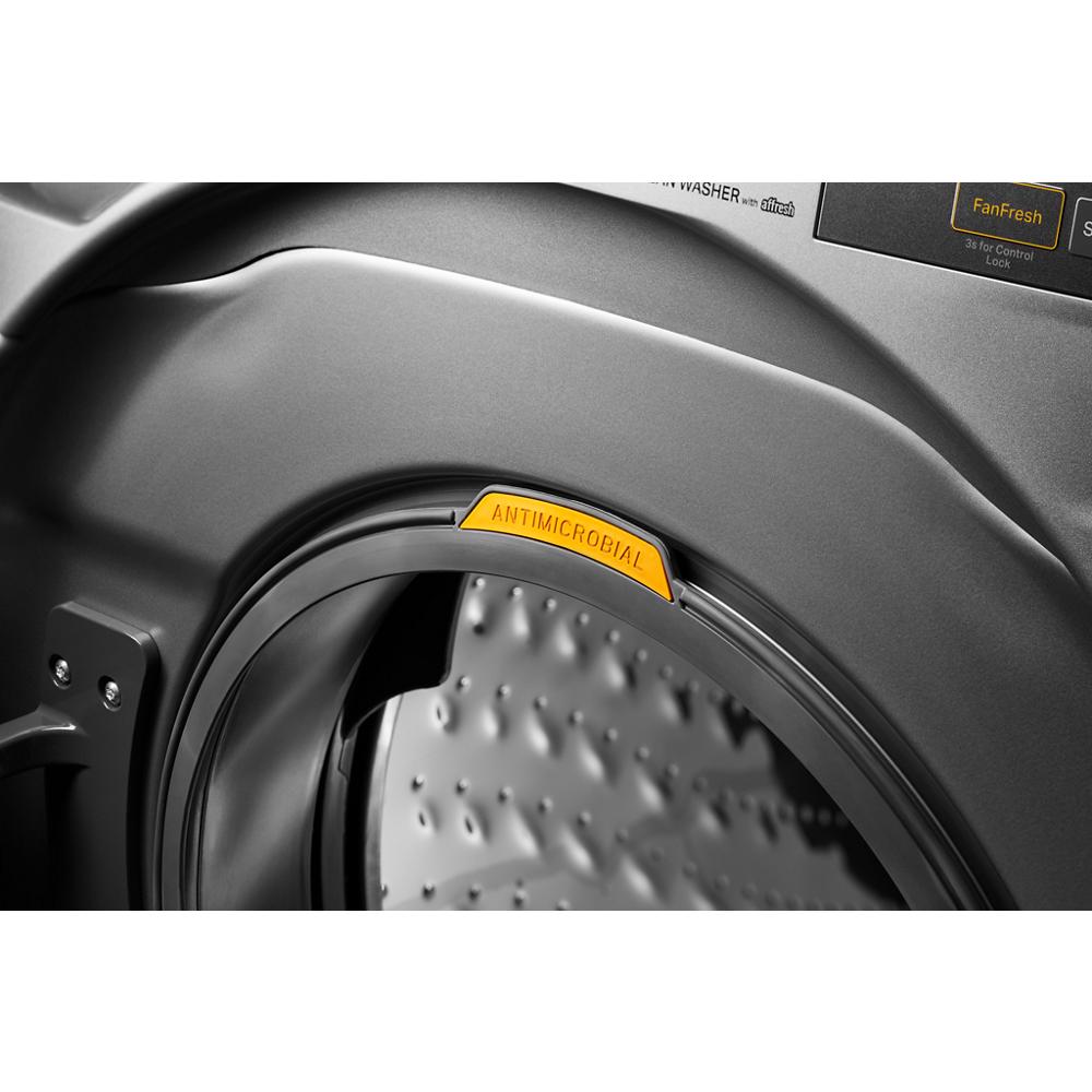 Close-up of washer door seal with antimicrobial label on a smart front load washer from washers and dryers collection