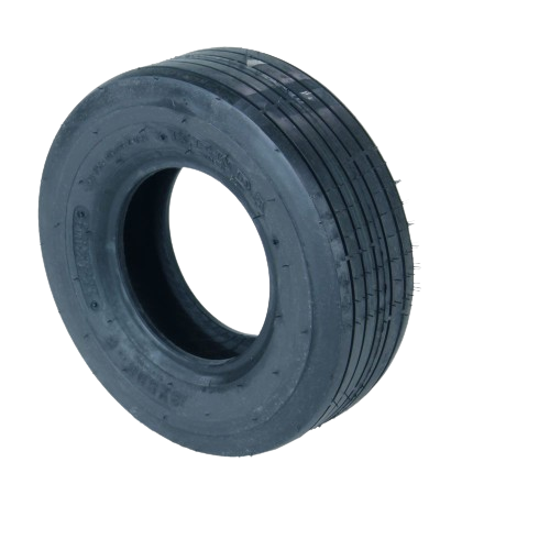 Heavy-duty tire with grooved tread designed for durable performance in outdoor equipment applications