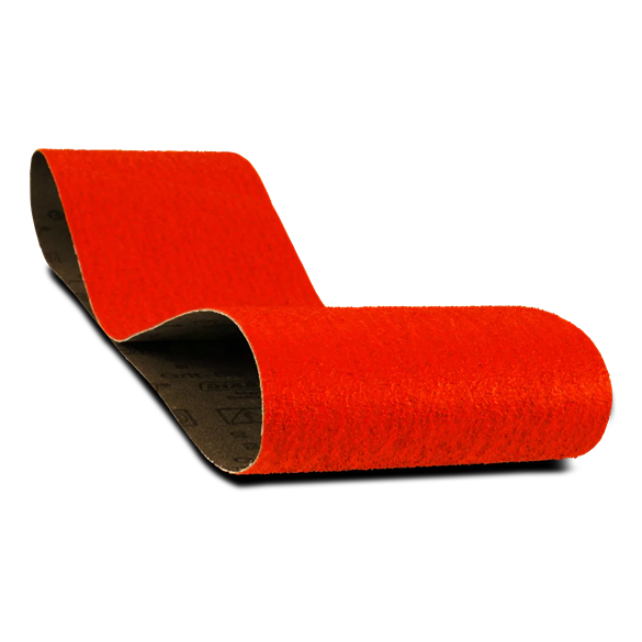 Red abrasive sanding belt with textured surface for power tool use in home improvement projects