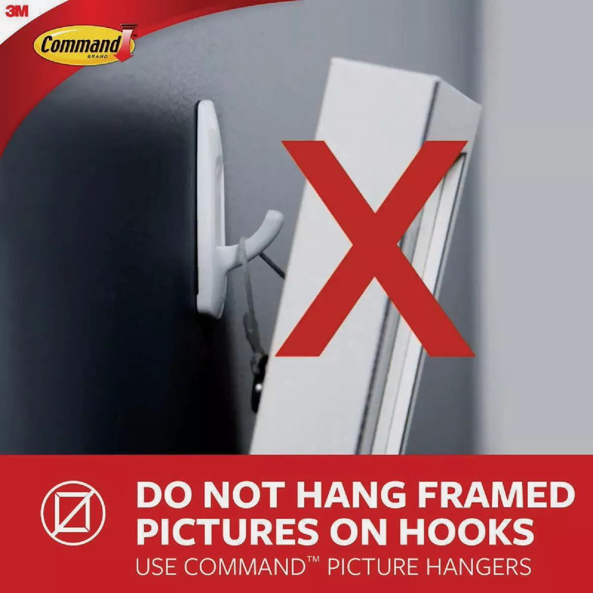 Large red X over frame hanging from adhesive hook with warning text against hanging framed pictures on hooks in hardware context
