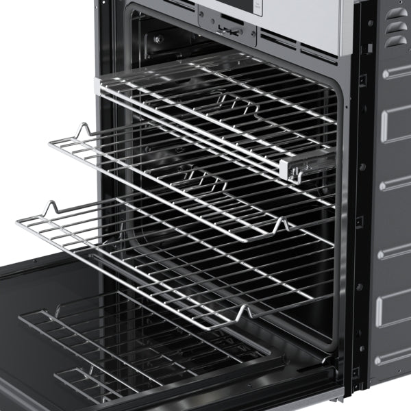 Open stainless steel wall oven showing multiple wire racks and sleek interior from Bosch kitchen appliances collection