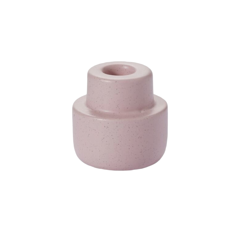 Small purple ceramic candleholder with smooth shape and subtle speckled finish for home decor accents